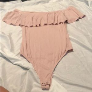 Pink body suit